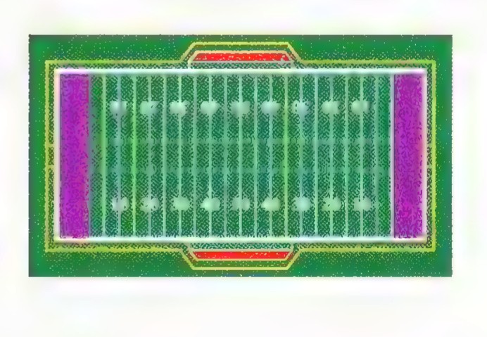 An aerial photograph of a football field with yard lines and end zones.