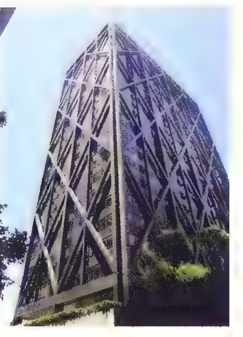 Photograph of the Alcoa Building in San Francisco, its facade covered by a diagonal grid of triangles.