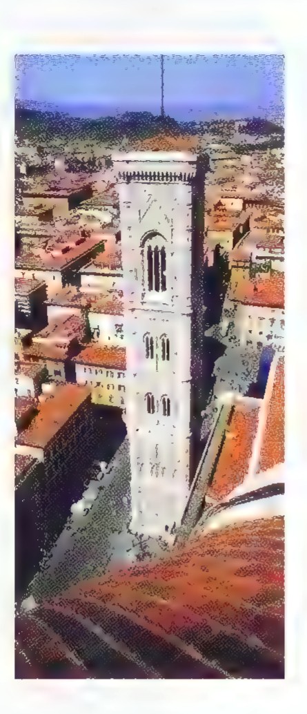 Photograph of Giotto’s campanile in Florence, looking up at the tower so that its upper stories appear successively taller.