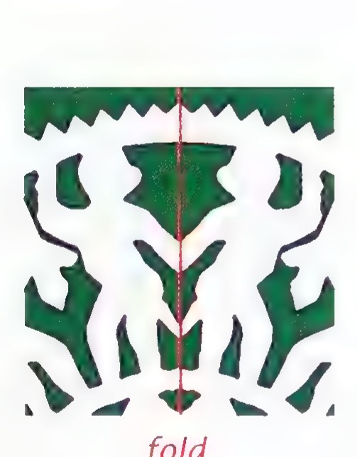 Two facing monkeys, one green and one white, separated by a vertical fold line labeled “fold.”