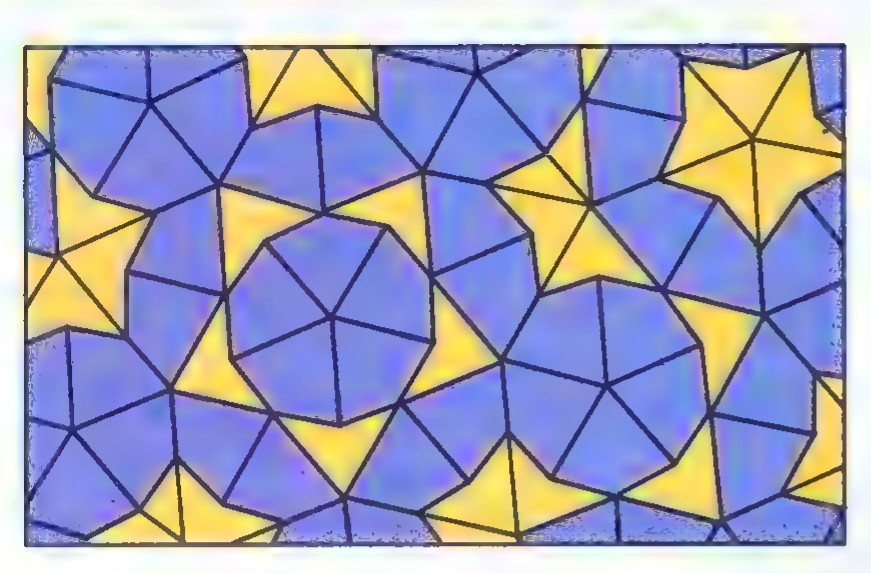A tiling of the plane by blue and yellow quadrilaterals, arranged in fivefold star patterns.