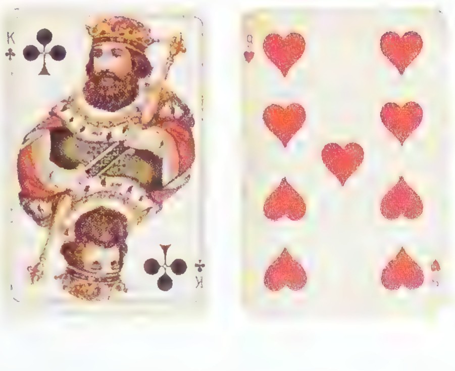 Two old playing cards side by side: the king of clubs and the nine of hearts.
