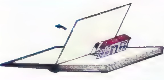 A pop-up book opened flat with a paper house standing up from the page.