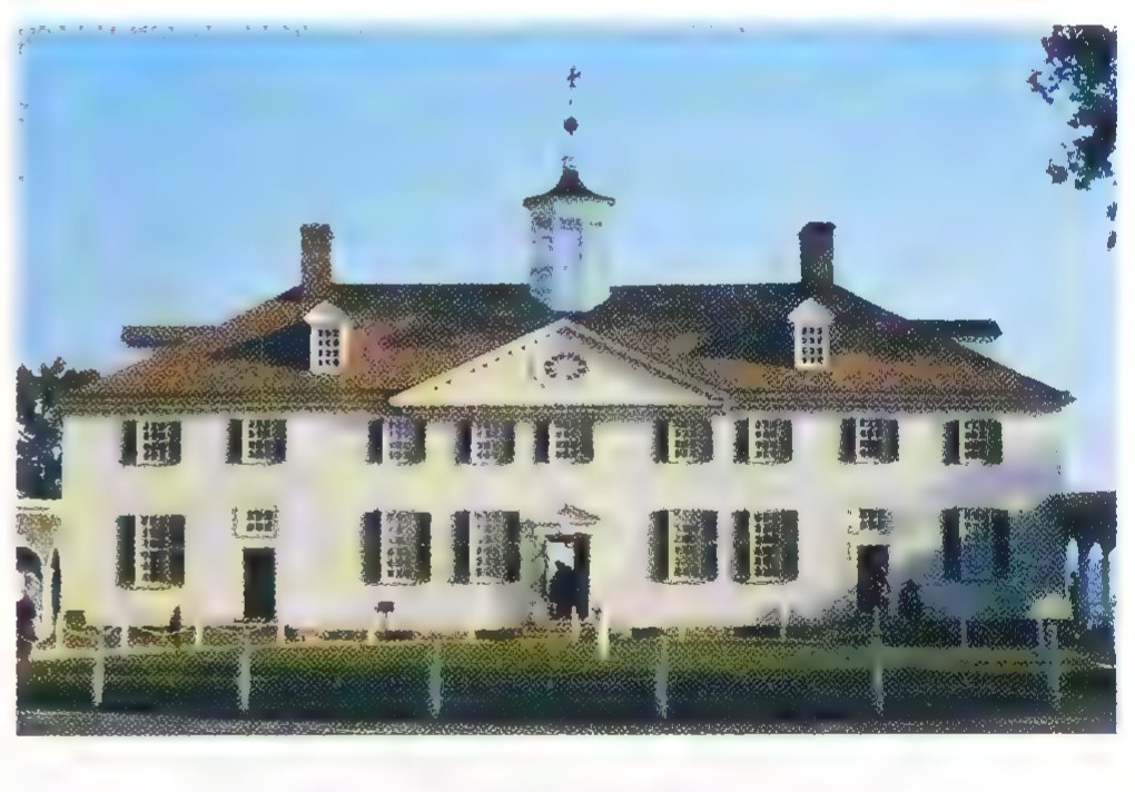 Photograph of Mount Vernon, a white two-story mansion with a cupola, dormer windows, and a columned porch.