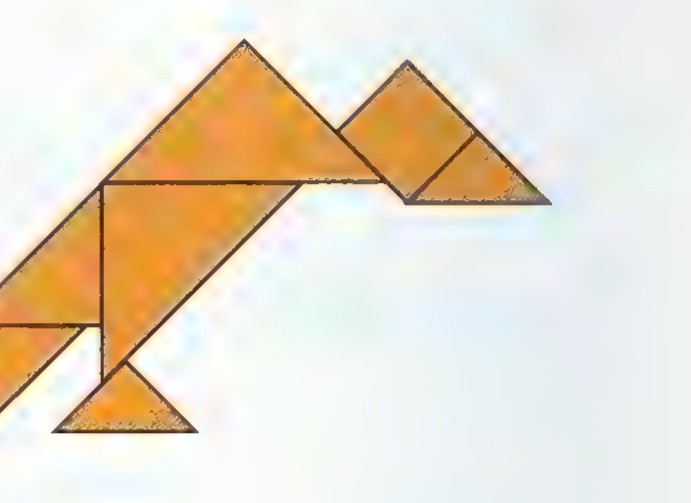 A tangram figure shaped like a vulture with spread wings.