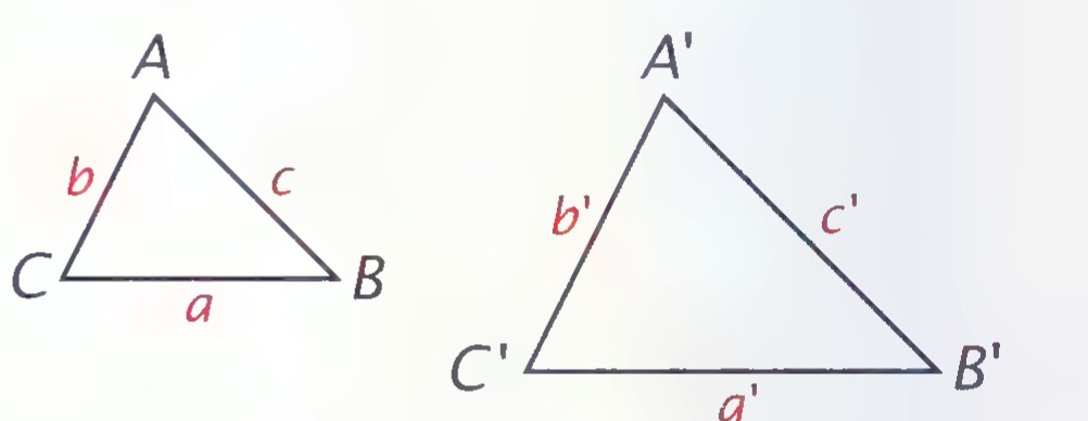 Two triangles, ABC with sides a, b, c and A′B′C′ with sides a′, b′, c′.