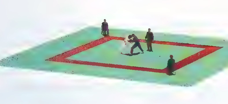 Photograph of a judo match on a mat, with a referee and two contestants.