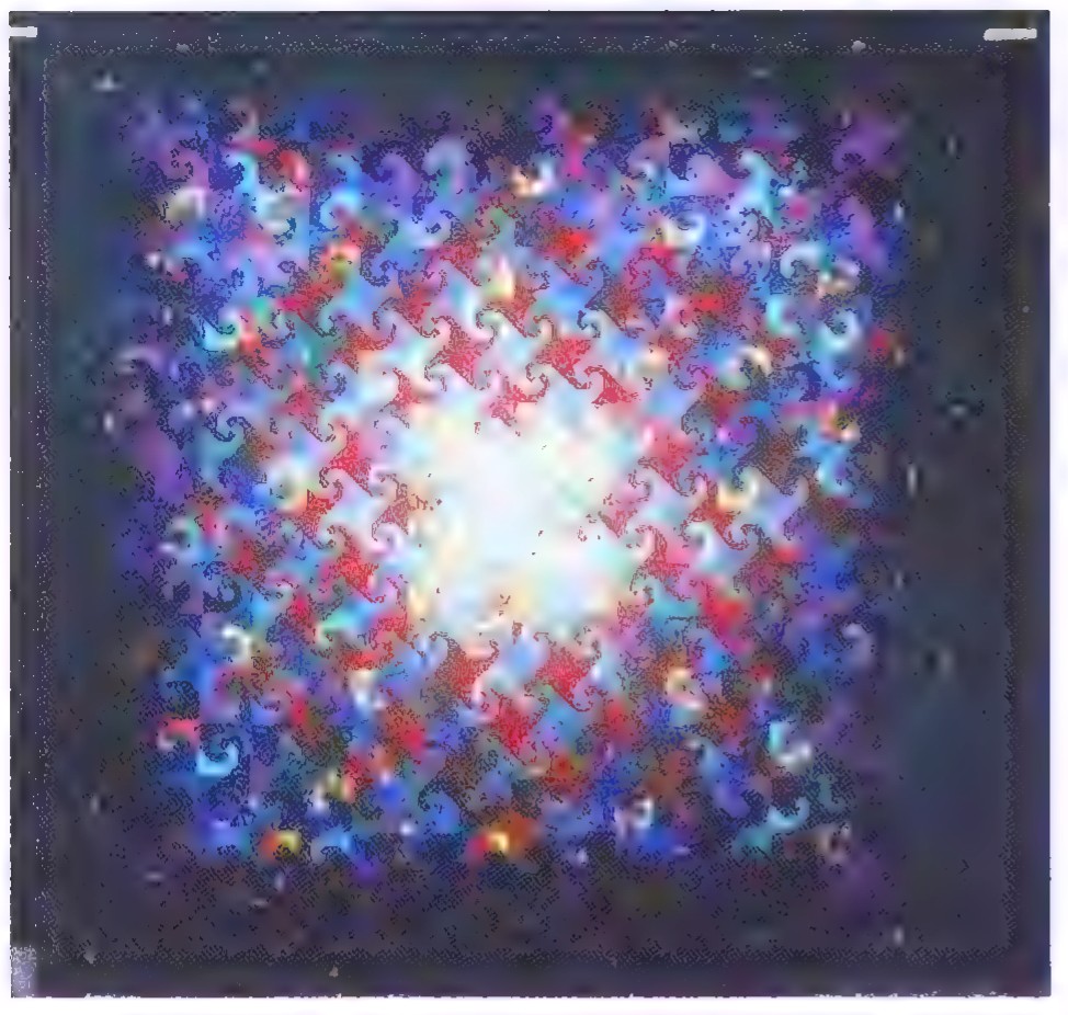 A photograph of a colorful tessellated quilt in which swirled shapes in blue, red, and gold form rings around a central opening.