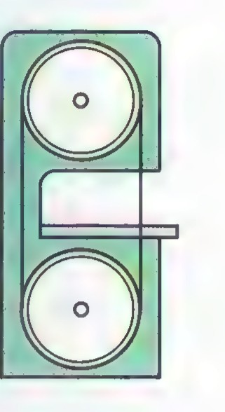 Photograph of the two wheels and frame of a band saw, with the blade running over both wheels.