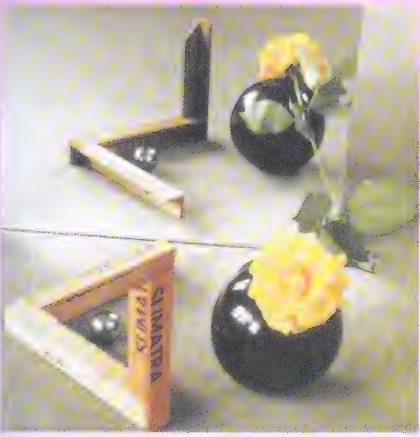 Still-life painting with flowers in dark vases, a glass sphere, and wooden frames on a patterned cloth.
