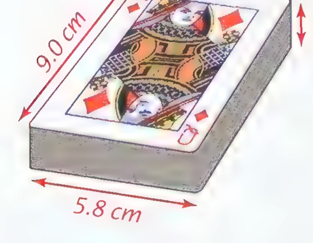 A deck of playing cards drawn as a rectangular solid, labeled 9.0 cm long, 5.8 cm wide, and 1.3 cm thick.