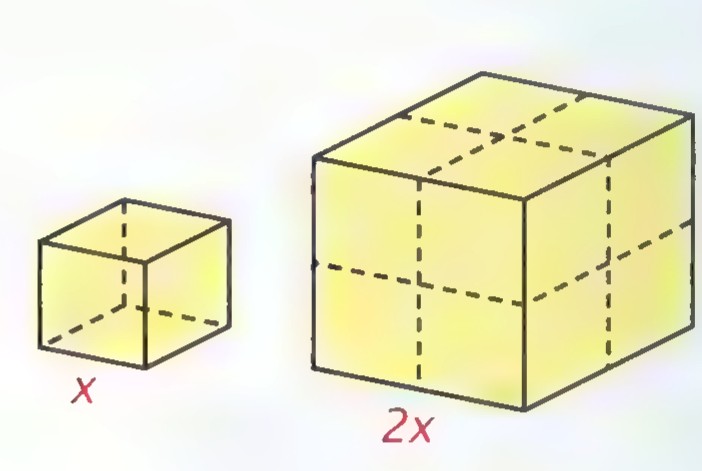 Two cubes, a small one with edge x and a larger one with edge 2x, with dashed hidden edges.