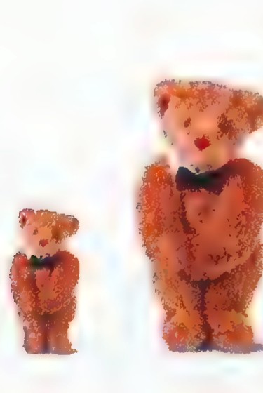 Two brown teddy bears, one twice as tall as the other, each with a red bow.