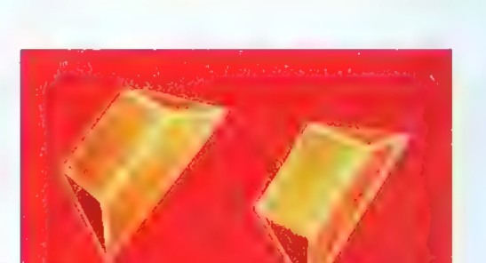 Two identical translucent yellow plastic puzzle pieces on a red background.